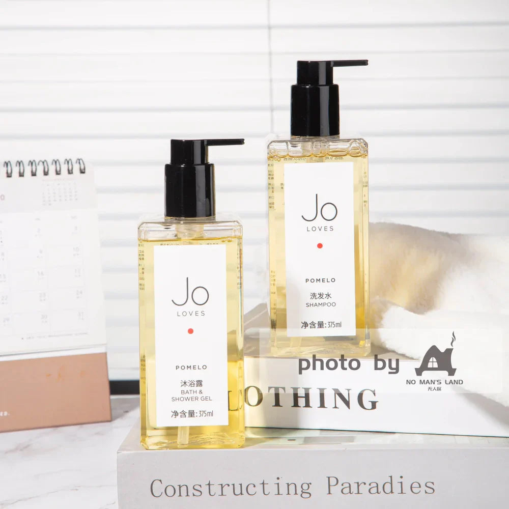 two bottles of JO-LOVES-POMELO-shampoo-shower-gel
