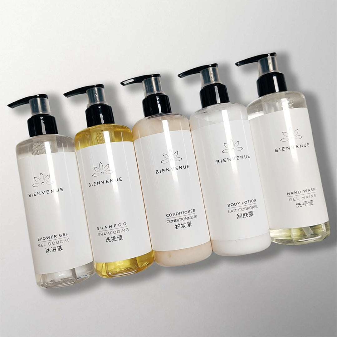 5 bottles of BIENVENUE hotel toiletries.