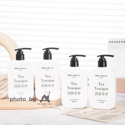 4 bottles of Miller Harris hotel toiletries displayed on the tray.